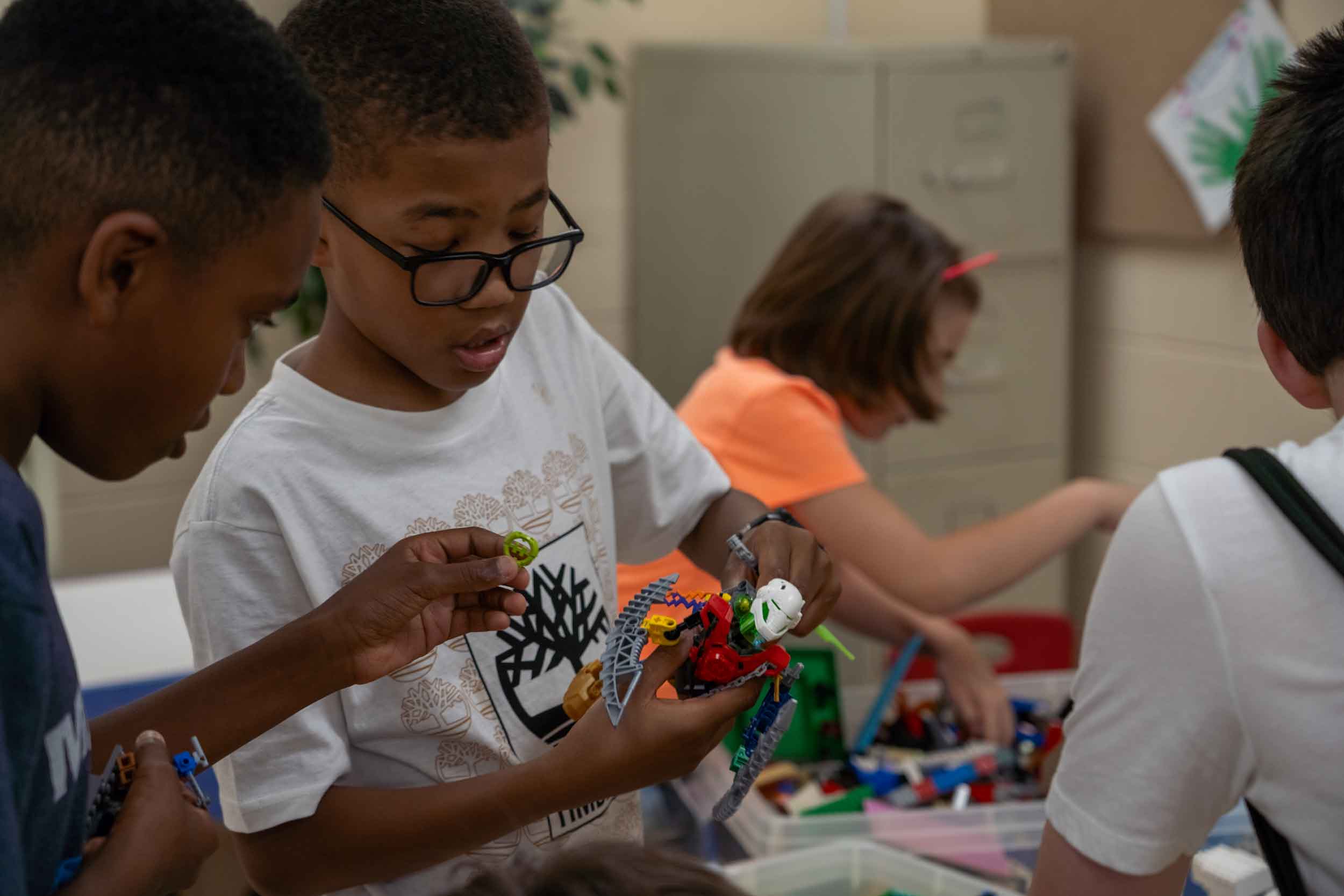 Kids playing with LEGOs